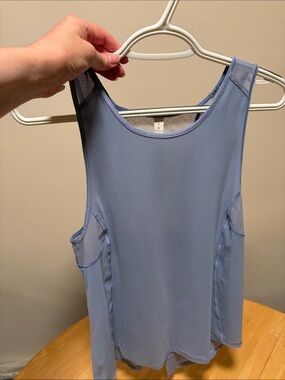 Lululemon Sculpt Tank *Tie Back
Blue -Size 4